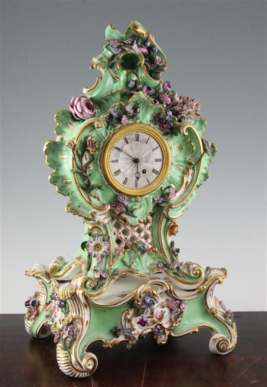 A Coalport floral encrusted mantel clock, with matching plinth, c.1830-5 17in.